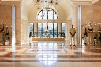 The beautiful lobby and grand entry chandelier at Four Seasons Resort Orlando create a welcoming arrival to Central Florida's top-rated resort.